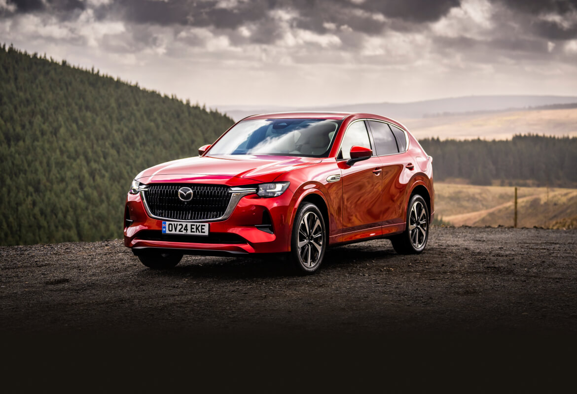 Red Mazda CX-60 in the countryside