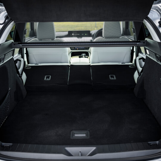 View of the Mazda MX-60 boot area with rear seats folded