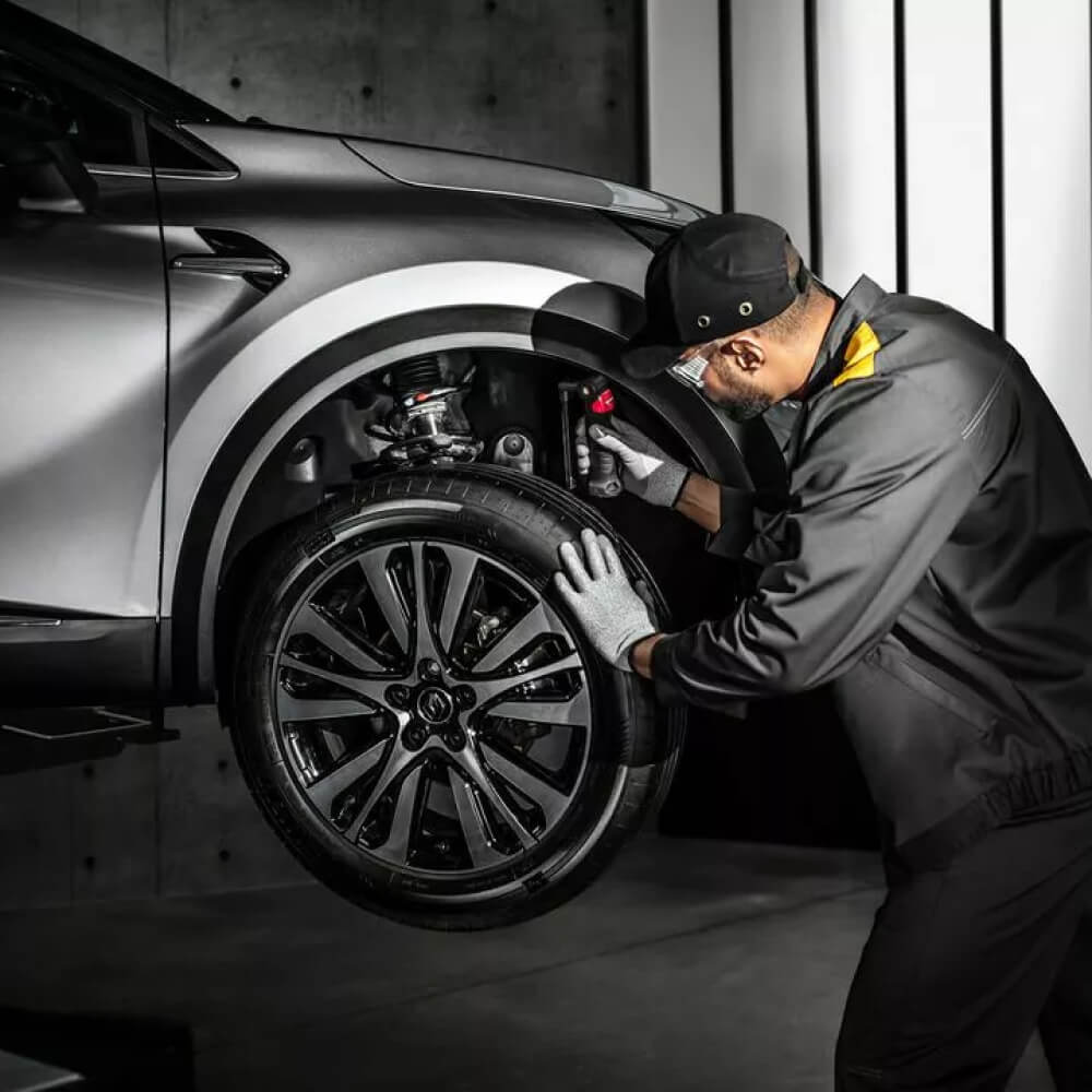 Renault trained technician working on car